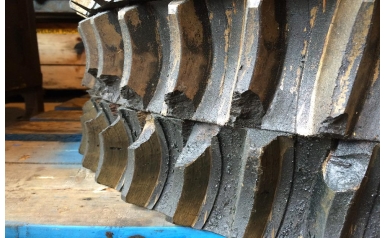 A damaged brass worm gear from the production line in Concord, Canada A damaged brass worm gear from the production line in Concord, Canada