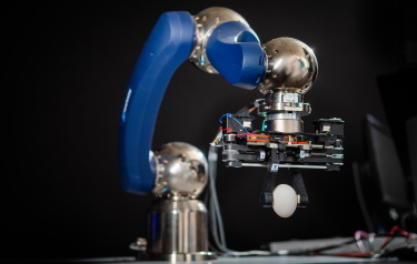 A robotic gripper developed in the lab of University at Buffalo engineer Ehsan Esfahani. The gripper is attached to a commercially available robot arm. (Credit: Douglas Levere/University at Buffalo)