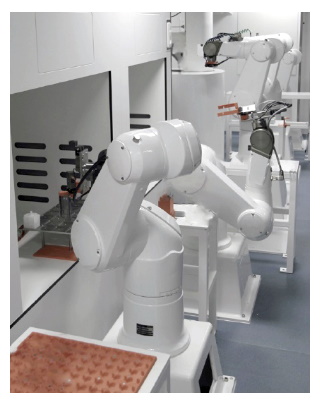 Six identical Stäubli Stericlean robots handle the implants