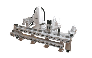 (Fig 1. SCARA machine in a mixed-robot cell with programmable modular conveyors)