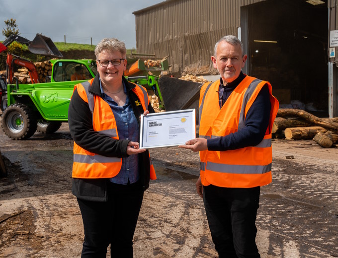 Sarah Woodhams, Made Smarter, presents Made Smarter award to Stephen Talbot, Logs Direct