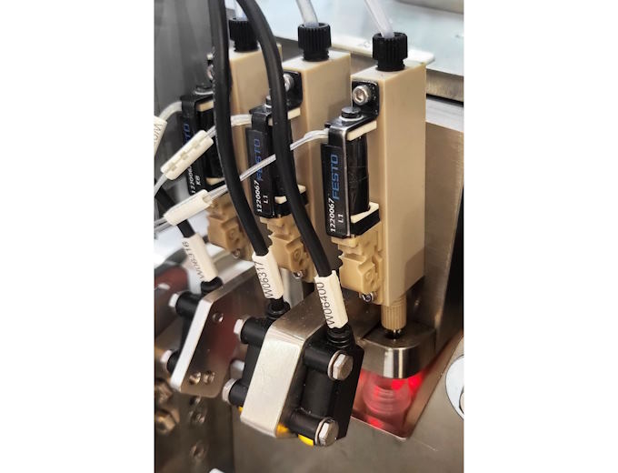 The automated filling line incorporates Festo’s VTOE dispensing heads and VAEM high speed valve control module The automated filling line incorporates Festo’s VTOE dispensing heads and VAEM high speed valve control module